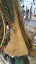 Unsoldered tip of brace on French Horn